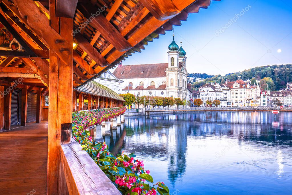 Romantic lakeside hotel terrace at sunset